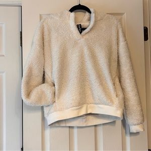 White fleece pullover with pockets and hood